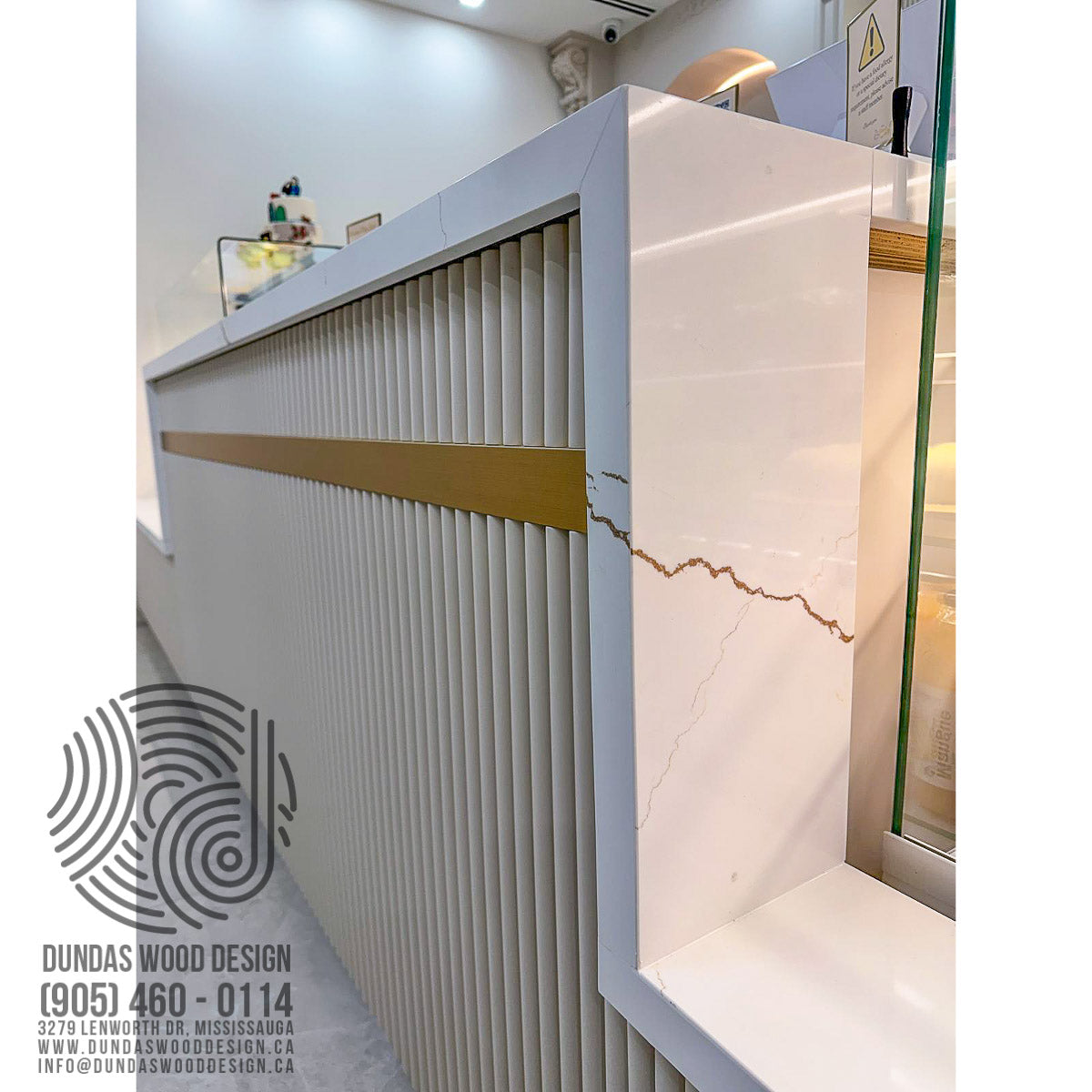 Elegant Cake Shop Counter with Marble and Gold Accents